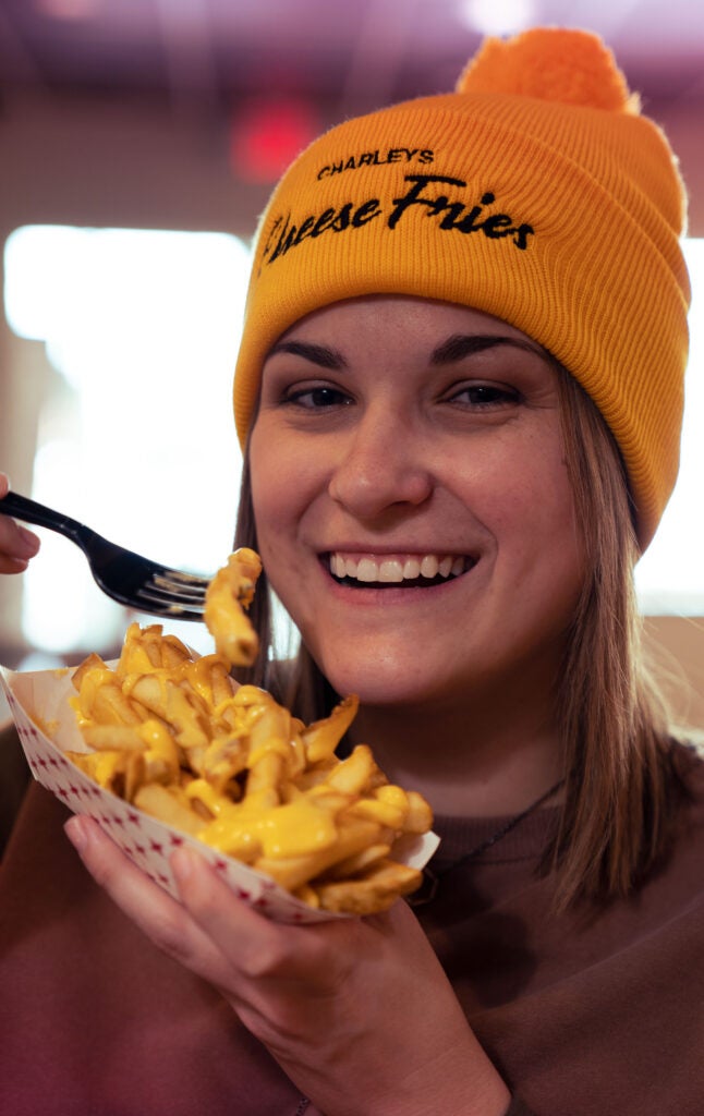 customer eating fries 