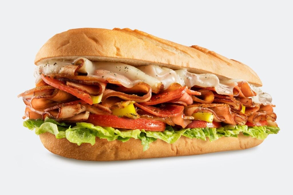 HOT SHOT ITALIANO cheesesteak with Oven-Roasted Turkey, Pepperoni, Banana Peppers, Melted Provolone then topped with Lettuce, Tomato, Mayo & Italian Seasoning
